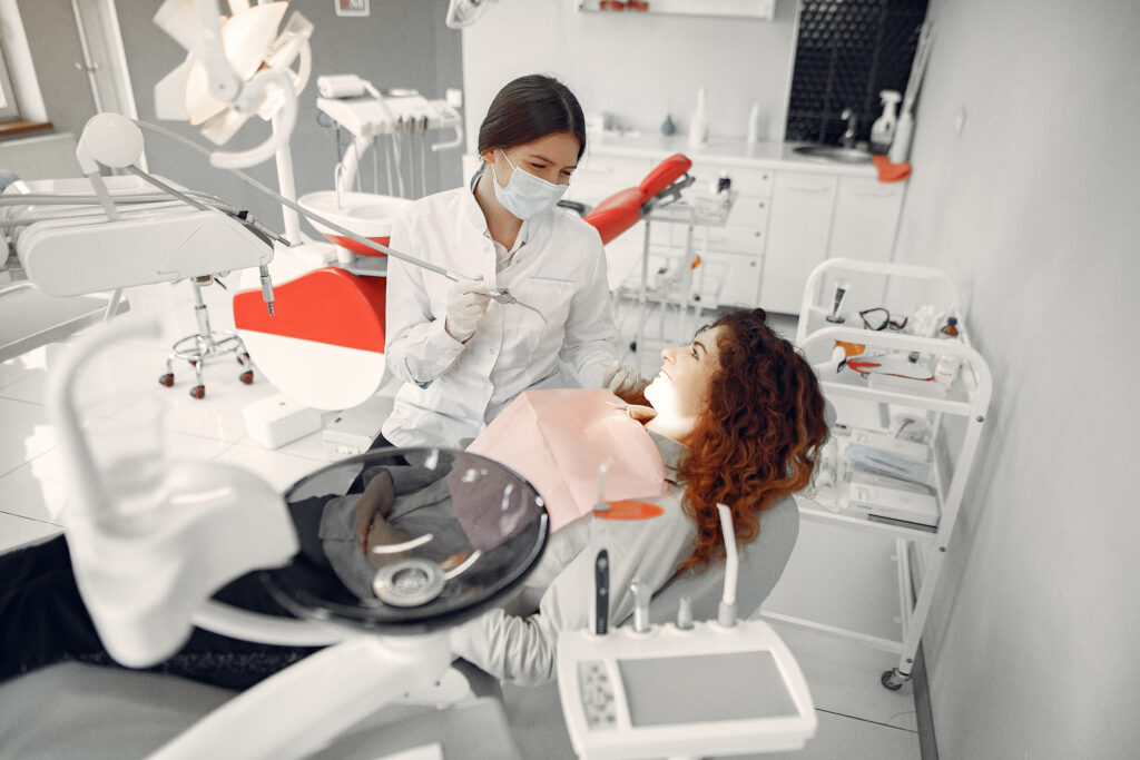 beautiful girl sitting in the dentist's office
