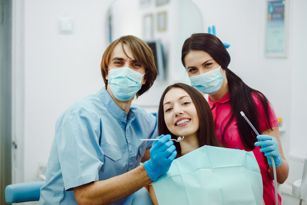 Dentist performing a dental check-up at a clinic in Anantapur